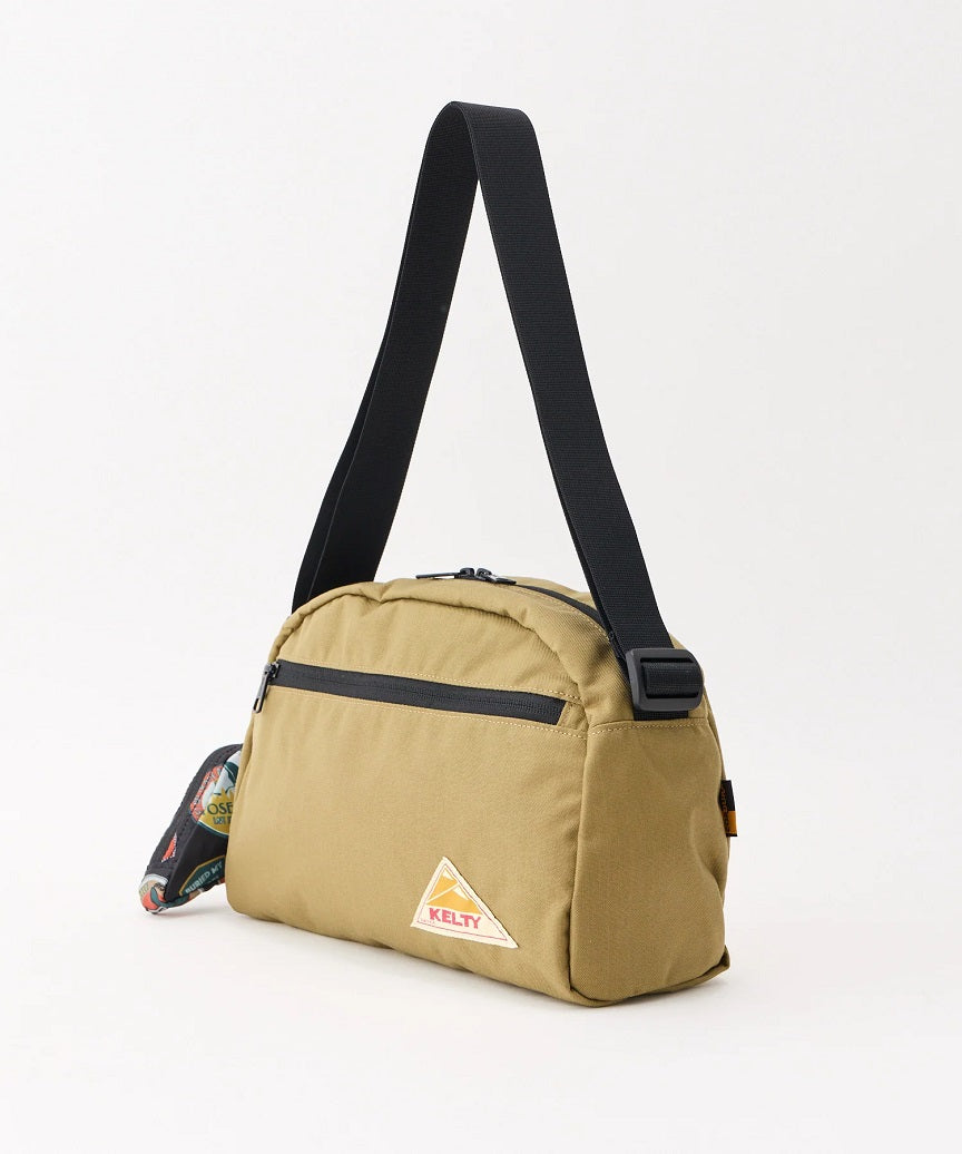 3259274026_LIMITEDROUNDTOPBAGM_Tan_3.jpg
