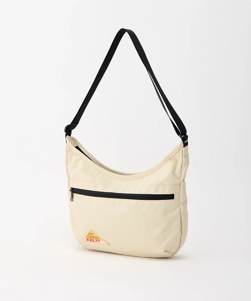 KT_3259270326_ESCURVESHOULDERS_Beige_1.jpg