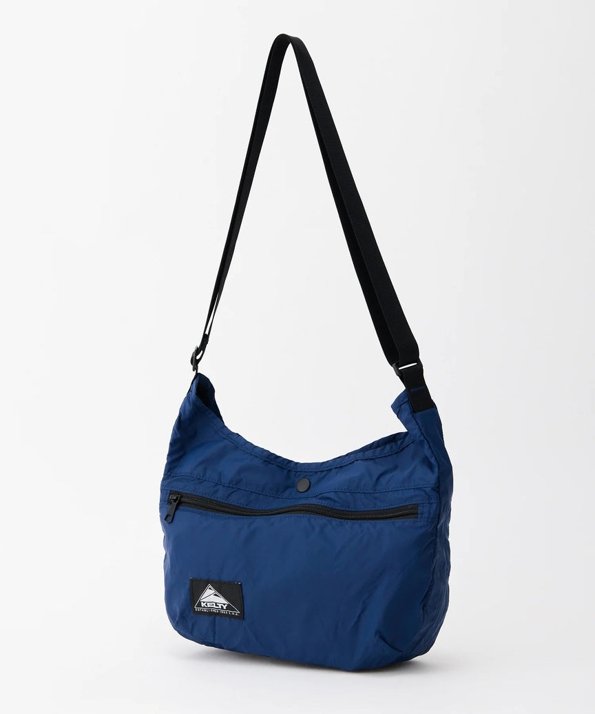 KT_3259273626_PACKABLECURVESHOULDERS_Navy_1.jpg